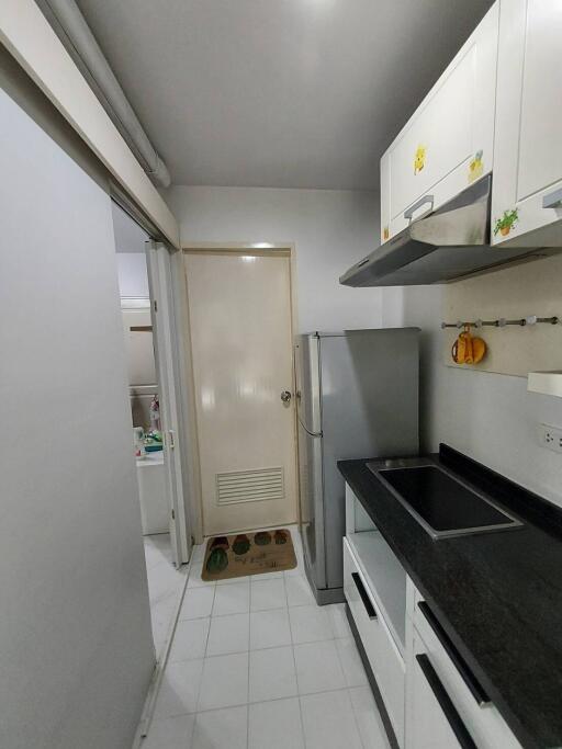 Modern kitchen area with appliances