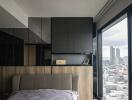 Modern bedroom with large windows and city view