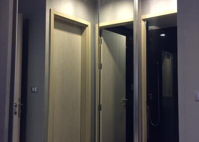 Hallway with mirrored sliding door