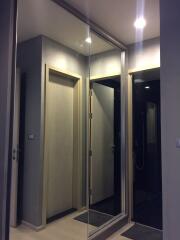 Hallway with mirrored sliding door