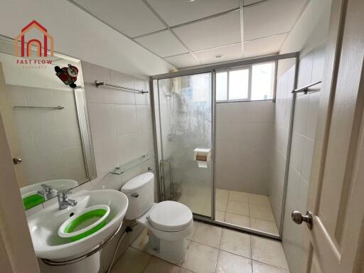 Modern bathroom with glass shower enclosure