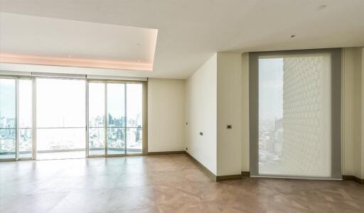 Spacious living room with large windows