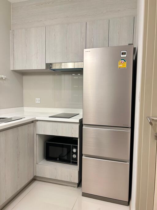 Modern kitchen with stainless steel appliances