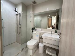 Modern bathroom with shower and vanity