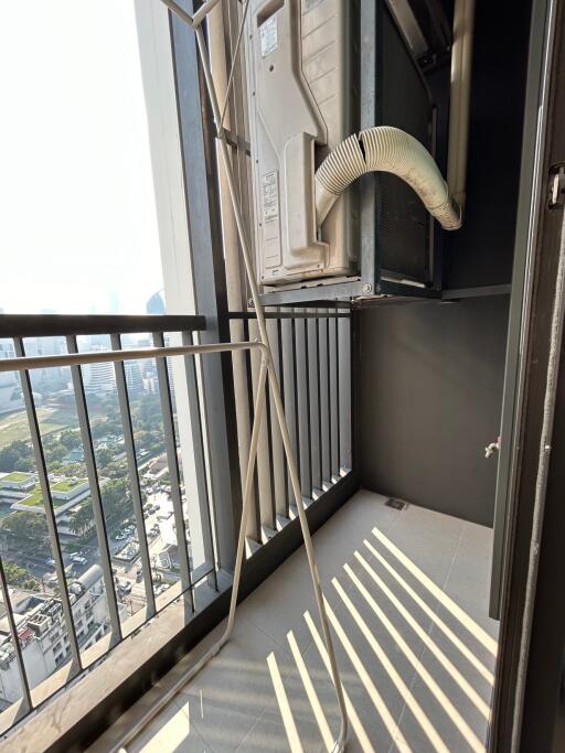 Modern high-rise balcony with air conditioning unit