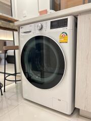 Laundry area with a modern washing machine