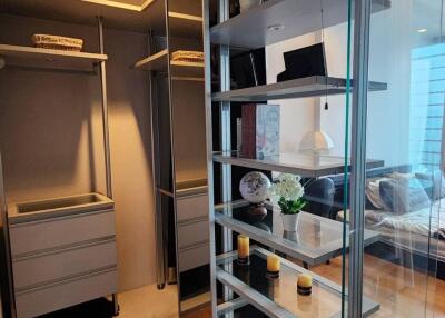 Well-organized closet with shelving and storage