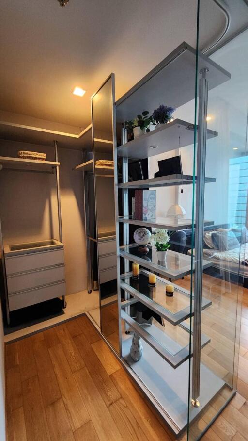 Well-organized closet with shelving and storage