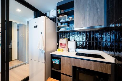 modern kitchen with appliances and shelving