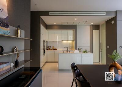 Modern kitchen with island and dining area