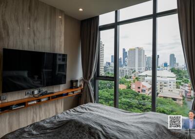 Modern bedroom with large window view