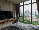 Modern bedroom with large window view