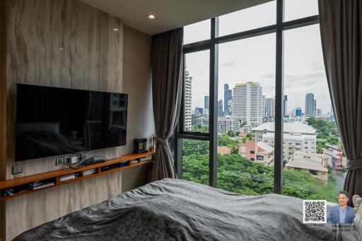 Modern bedroom with large window view