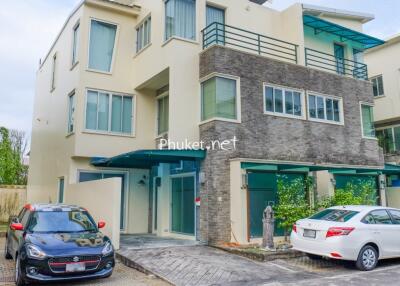 Modern three-story townhouse with parking