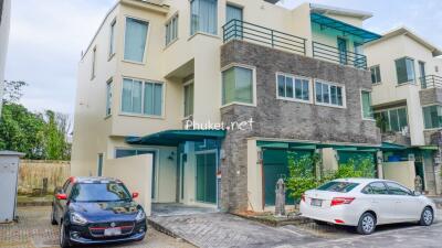 Modern three-story townhouse with parking