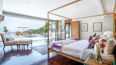 Bright and spacious bedroom with pool view