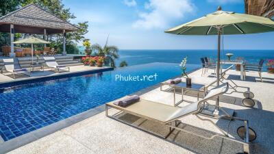 Luxurious outdoor area with pool and sea view