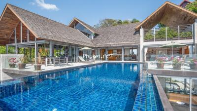 Modern villa with swimming pool and patio area