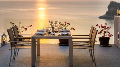 Outdoor dining area with a sea view