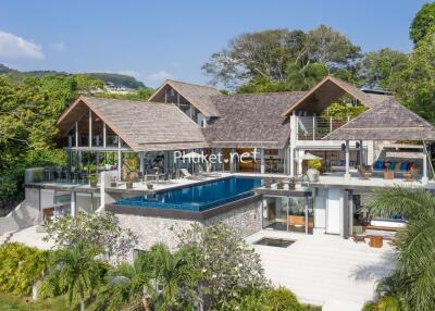 Spacious luxury villa with outdoor pool and tropical surroundings