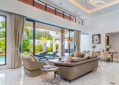 Spacious living room with pool view