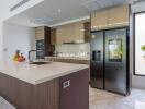 Modern kitchen with island and stainless steel appliances