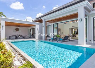 Modern villa with swimming pool and patio area