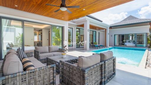 Outdoor living area with pool and seating