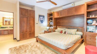 Modern bedroom with wooden furnishings