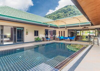 Outdoor area with swimming pool and seating area