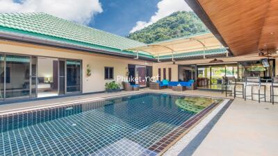 Outdoor area with swimming pool and seating area