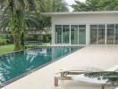 Outdoor pool area with modern amenities