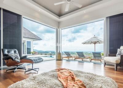 Modern living room with panoramic views and patio access