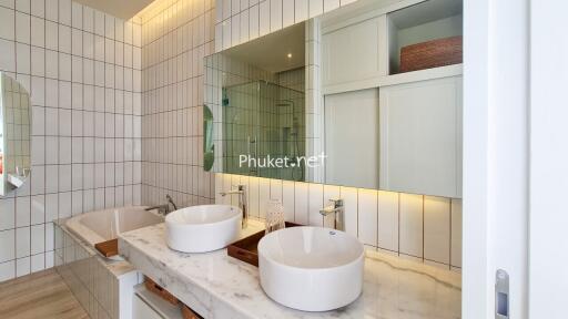 Modern bathroom with double sink and large wall mirror