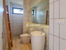 Modern bathroom with white tiles and wooden accents