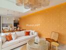 Modern living room with orange accent wall and decorative lighting