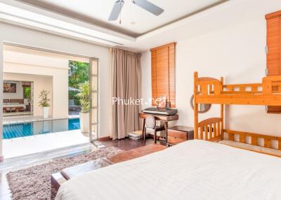 Bright bedroom with pool view