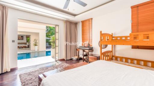 Bright bedroom with pool view