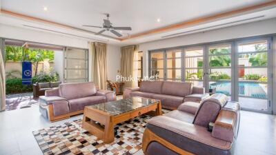 Spacious and modern living room with pool view