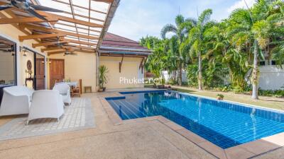 Outdoor area with swimming pool and seating