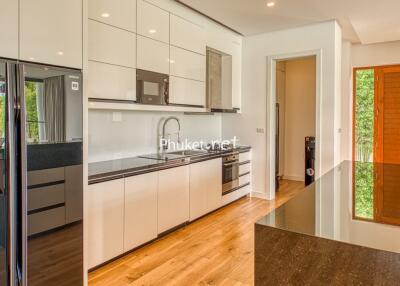 Modern kitchen interior with appliances and island