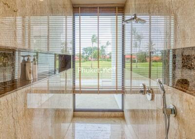 Modern bathroom with large window and shower