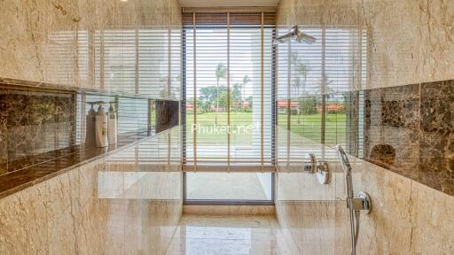 Modern bathroom with large window and shower