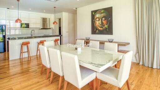 Modern dining area with kitchen