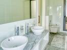 Modern bathroom with dual sinks and marble countertop