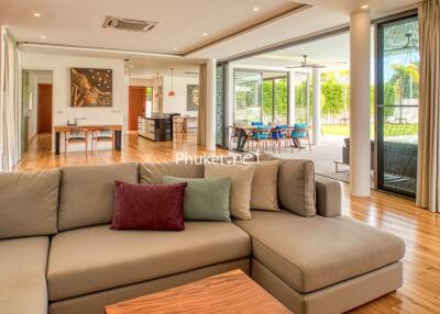 Spacious living room with modern furniture and large windows