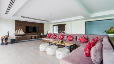 Spacious living room with sectional sofa and modern decor