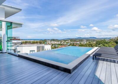 Modern rooftop pool with scenic view