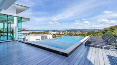 Modern rooftop pool with scenic view