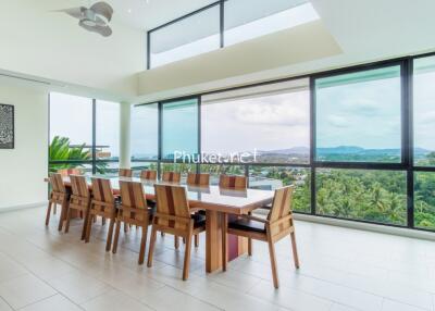 Spacious dining area with large windows and scenic views